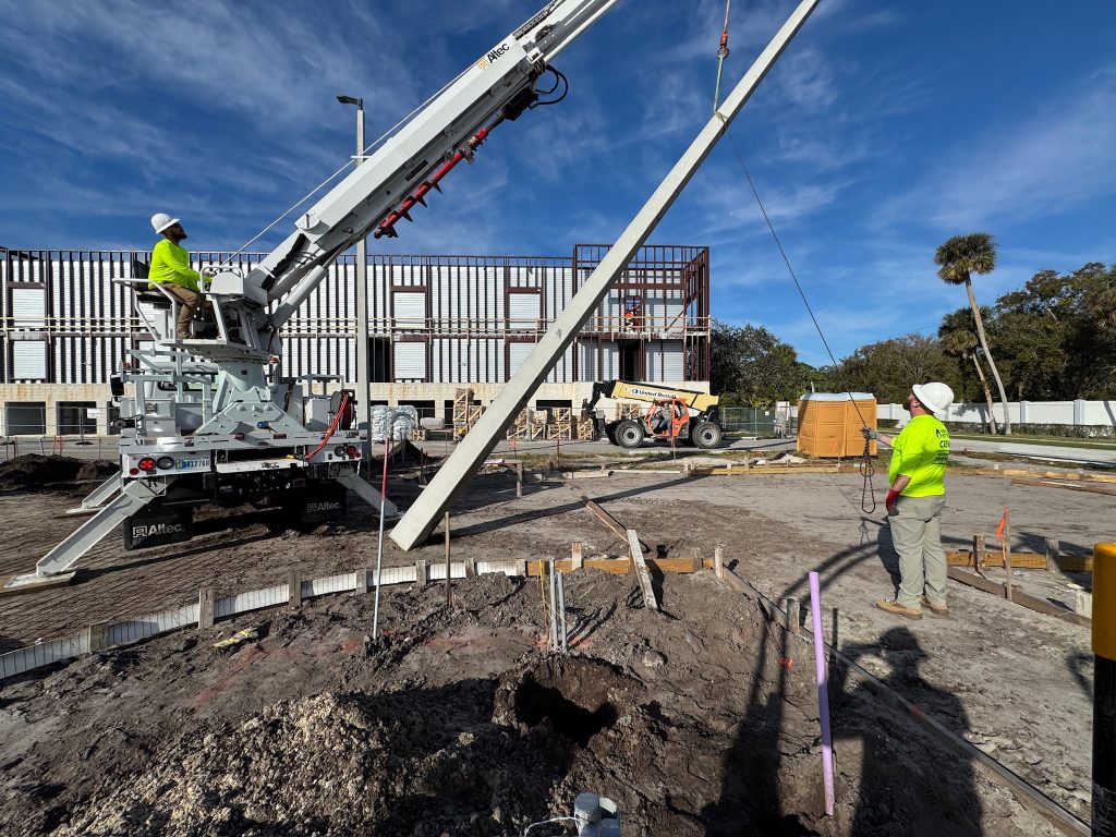 Gorilla Pole Setters Crew installing a concrete light pole.