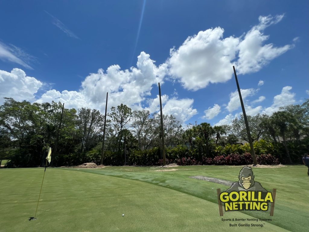 Eagle Creek pole installation for a golf netting system.