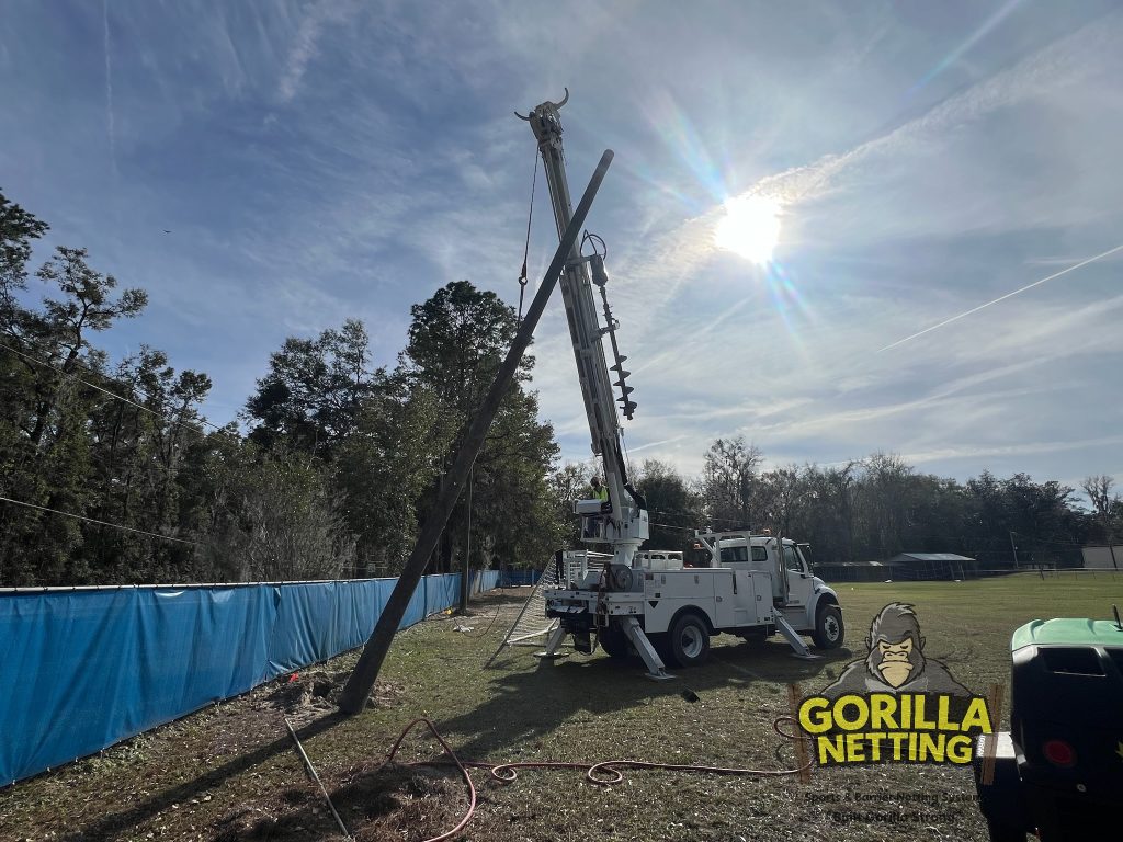 Epiphany Catholic School soccer backstop pole installation.