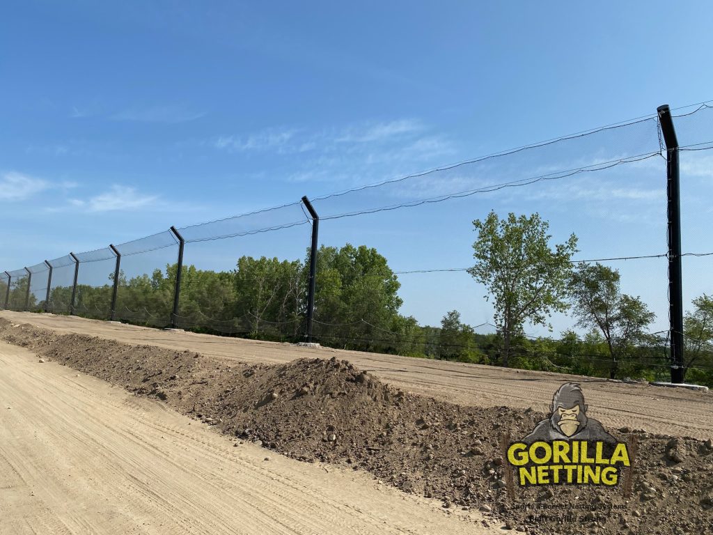 Litter Control Fence poles installed for a landfill.